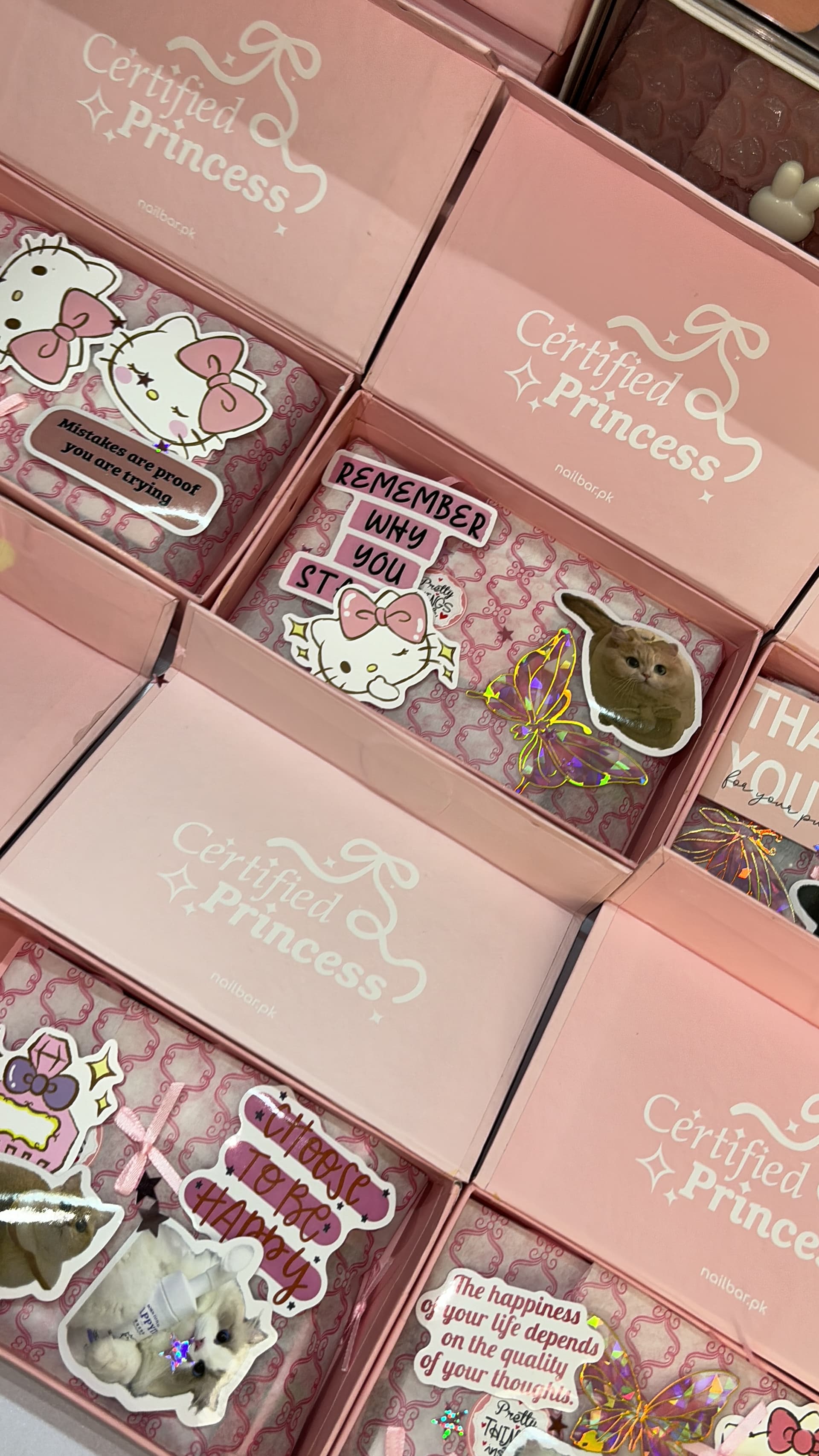 Stickers and a handwritten note going into each box