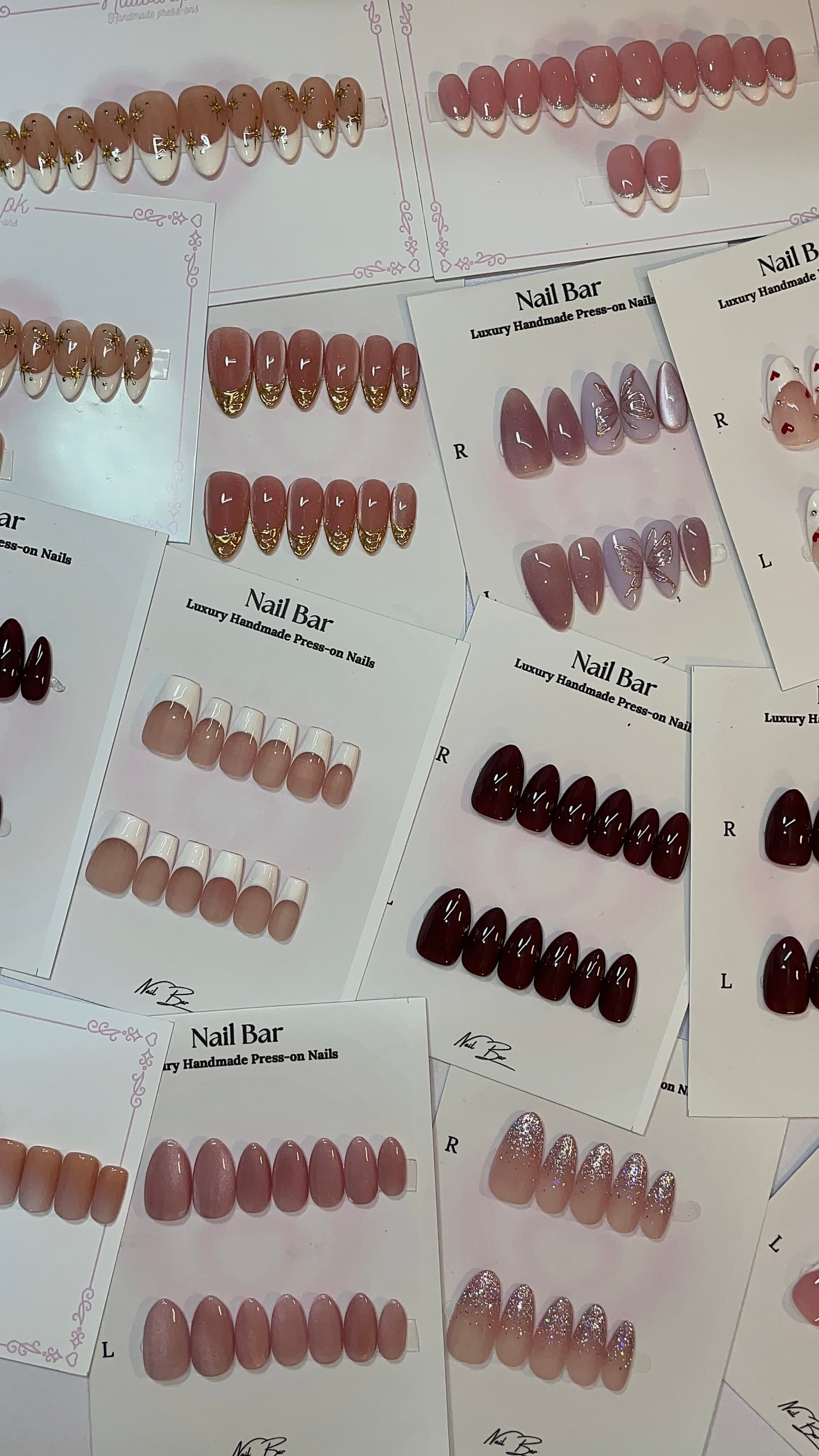 Dozens of finished sets on Nailbar cards, waiting to be packed
