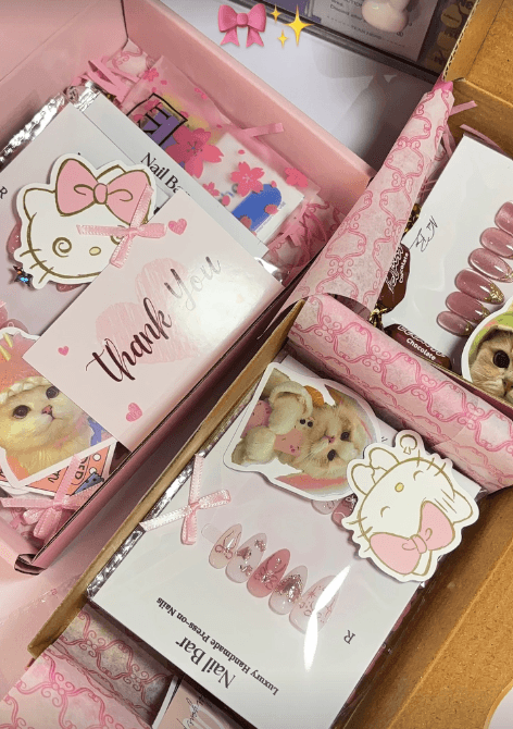 The packing table, with thank-you cards and stickers