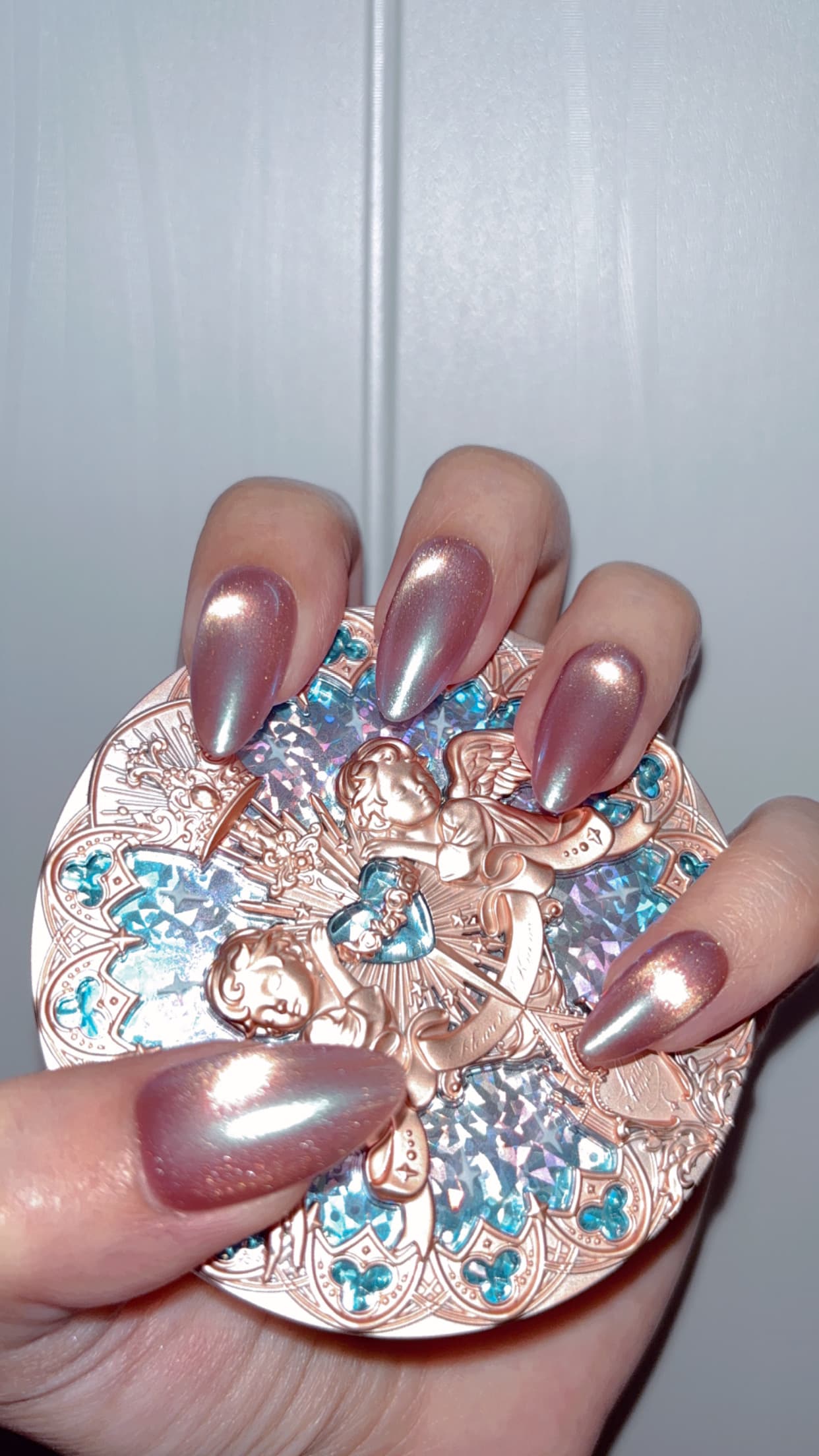 A rose chrome almond set, worn