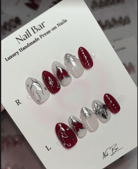 A deep red and silver set with hearts, on its card